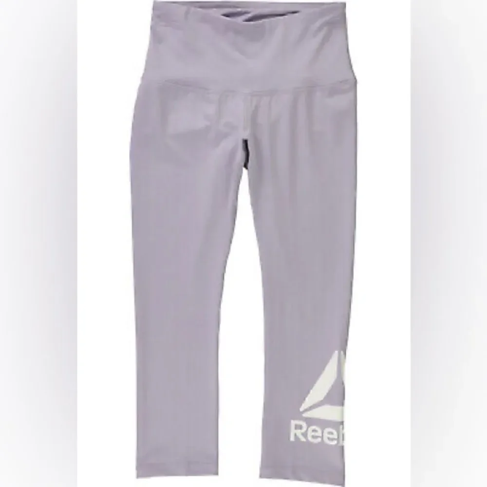 Stay Fit in Style: Reebok Women's Wanderlust Capri Compression Athletic Pants